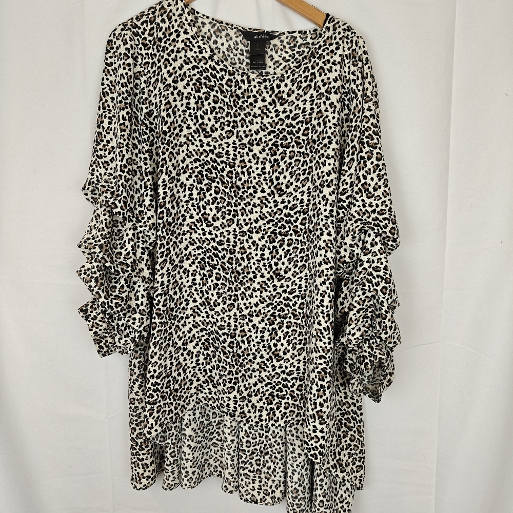 Ali Miles Black and White Leopard Print Ruffle Sleeve Blouse
🚭